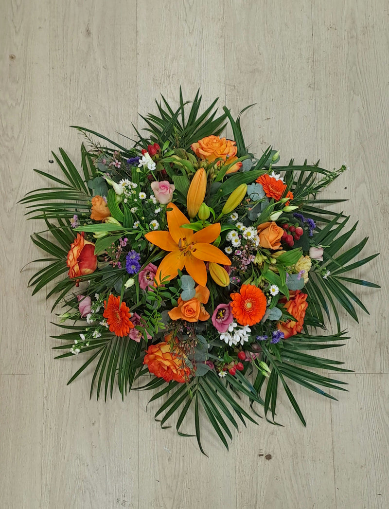 Le Coussin Rond de saison – Au Delà des Fleurs, fleuriste à Gujan-Mestras